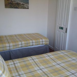 Zimmer mit zwei Einzelbetten im 2 Stock